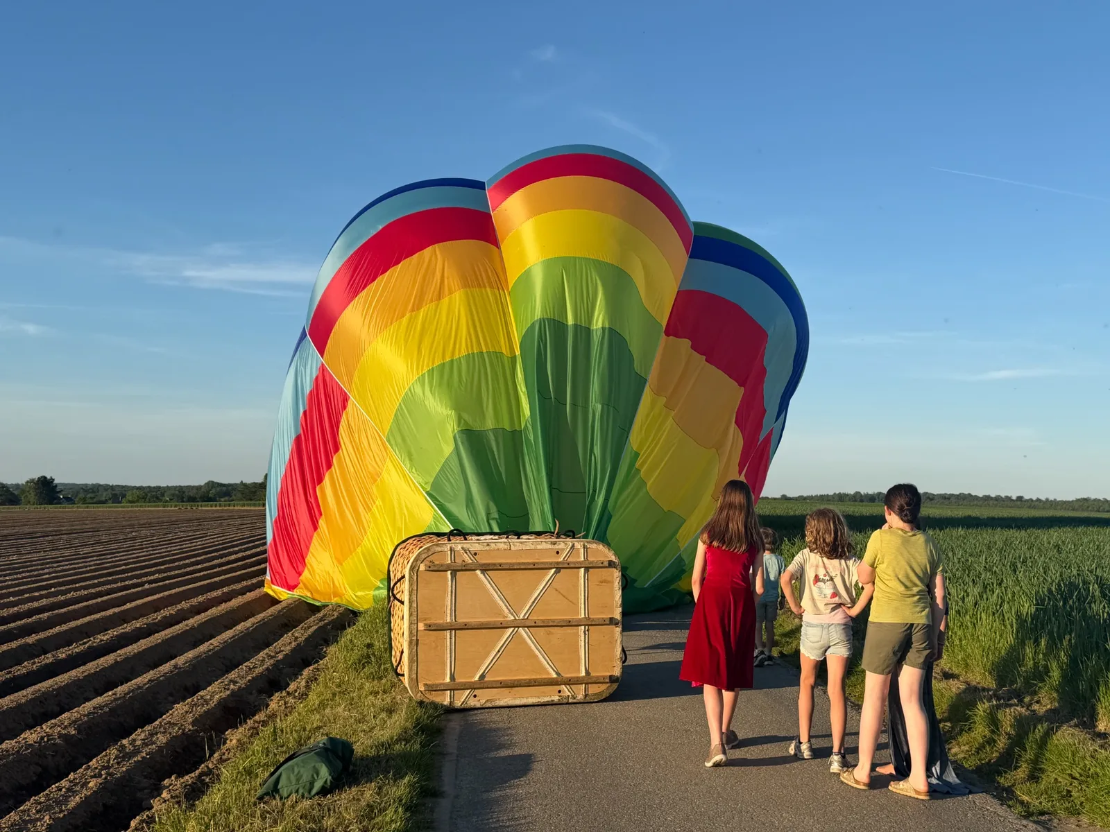Preparing a colourful hot air balloon with the crew
